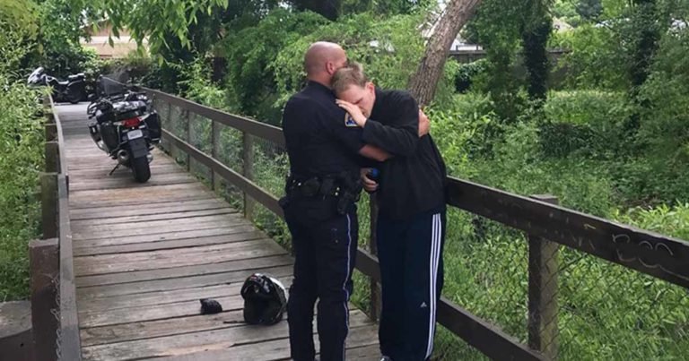 officer comforts man with special needs