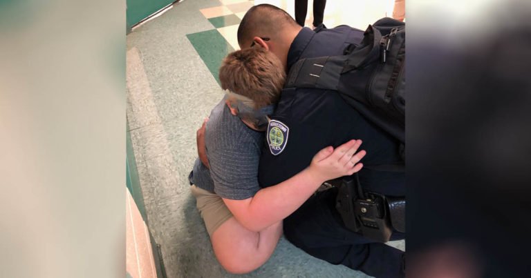 school-rescue-officer-comforts-autistic-boy