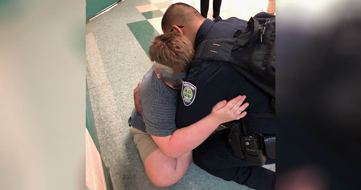 school-rescue-officer-comforts-autistic-boy