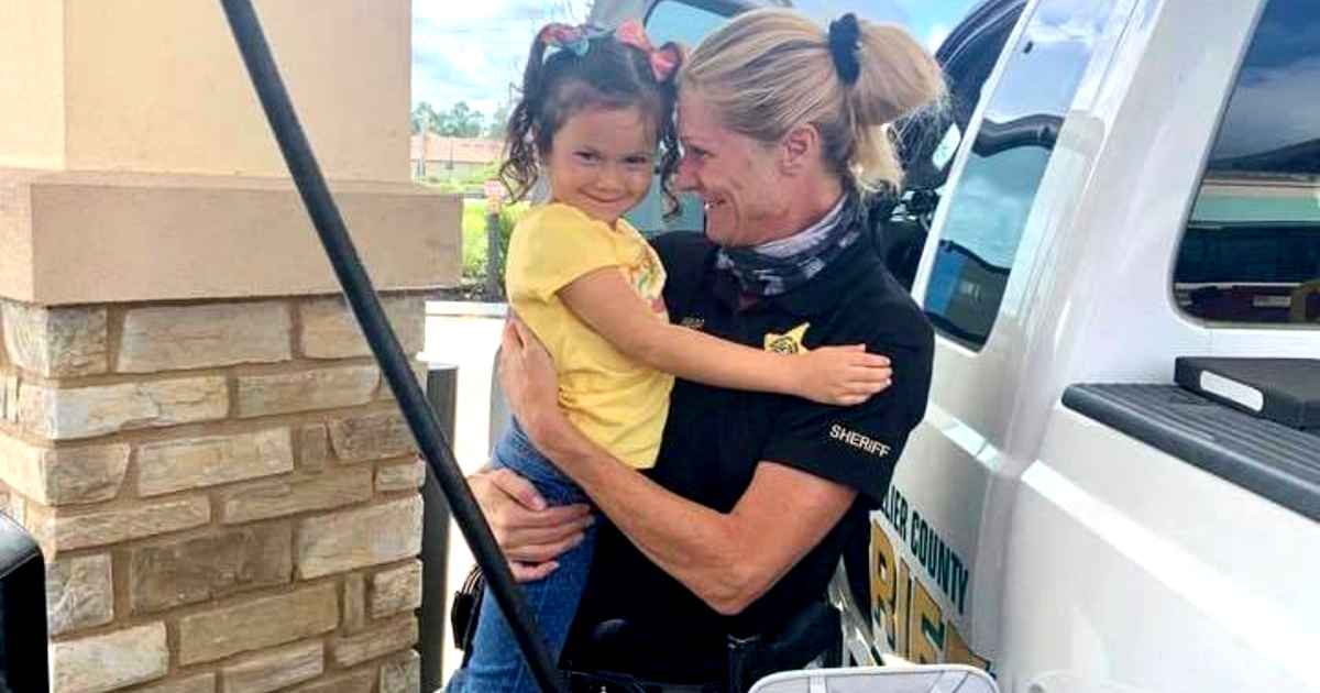 little-girl-hugs-police-officer