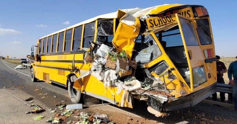 semi truck hits school bus