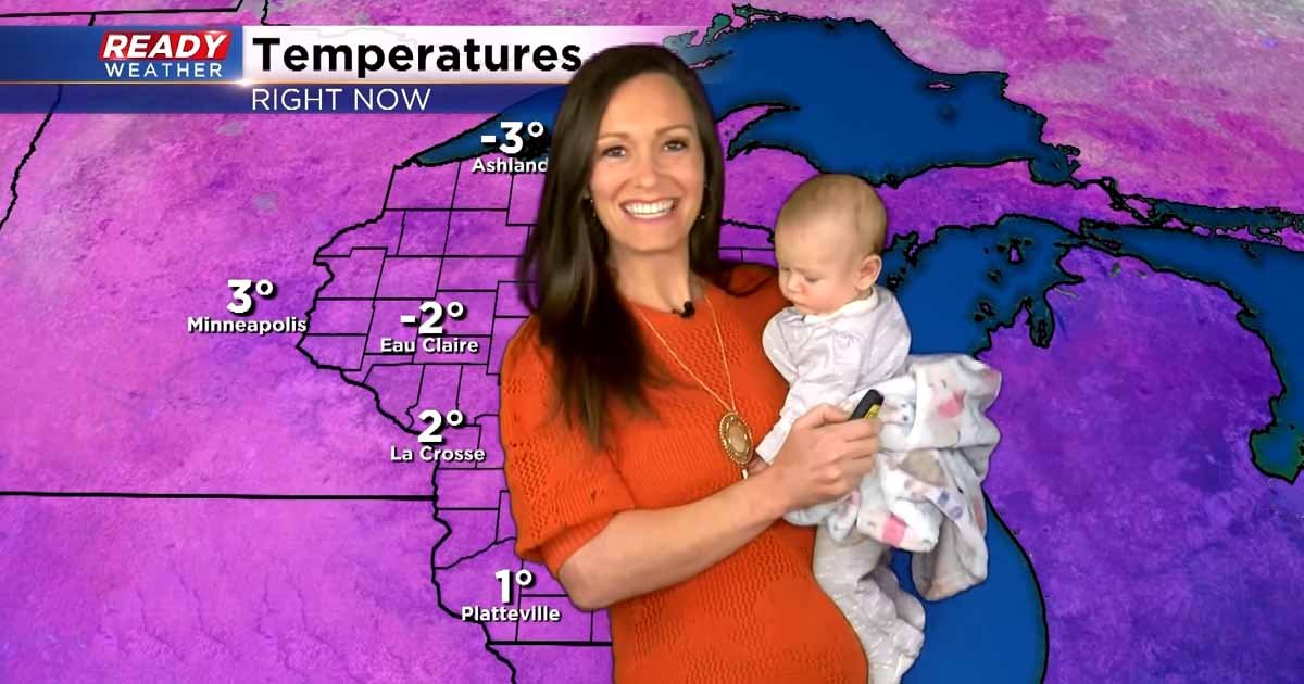 weather-reporter-with-baby-rebecca-schuld