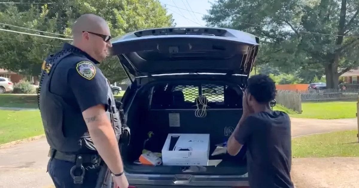 officer buys playstation for boy