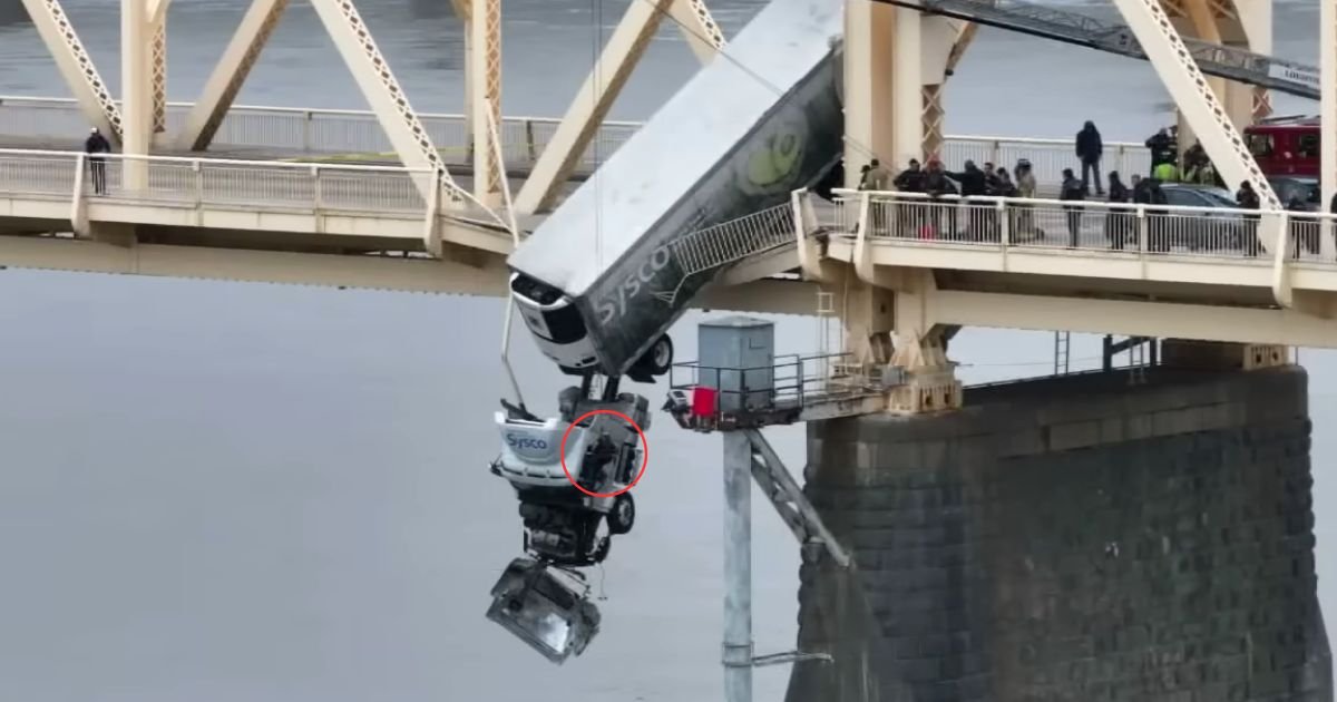 semi truck hanging off bridge Louisville