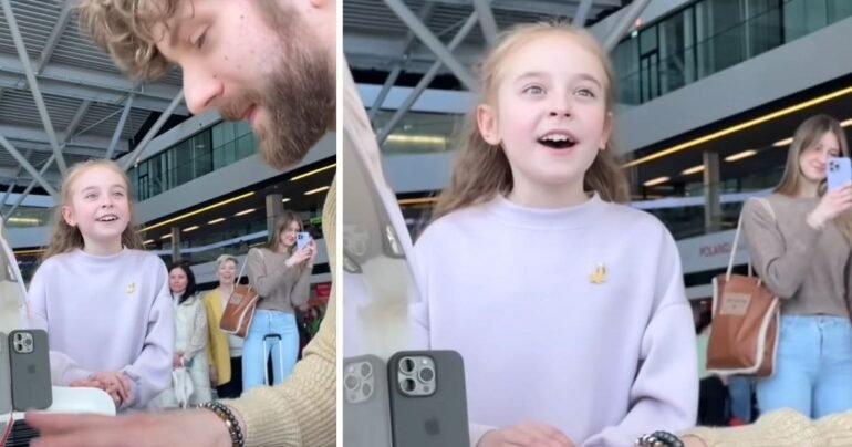 little girl singing let it go warsaw airport