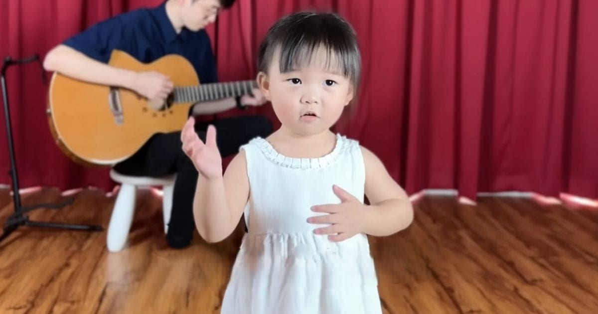 little girl sings goodness of god