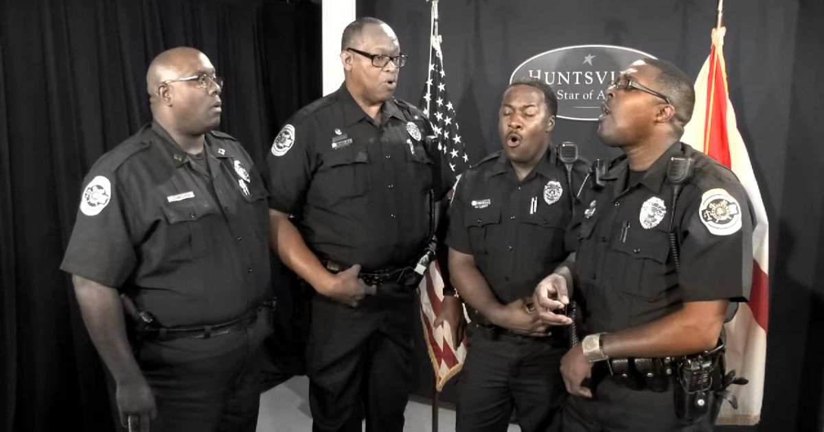 police officers worshipping god