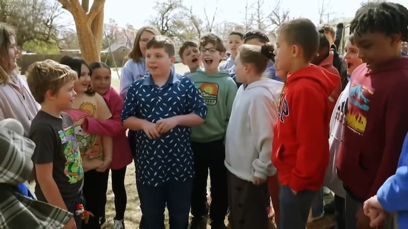 samuel henderson with his friends at school