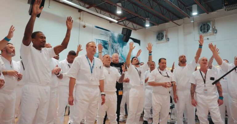 inmates worshipping how great is our god