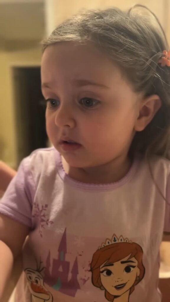 little girl seeing ultrasound pictures