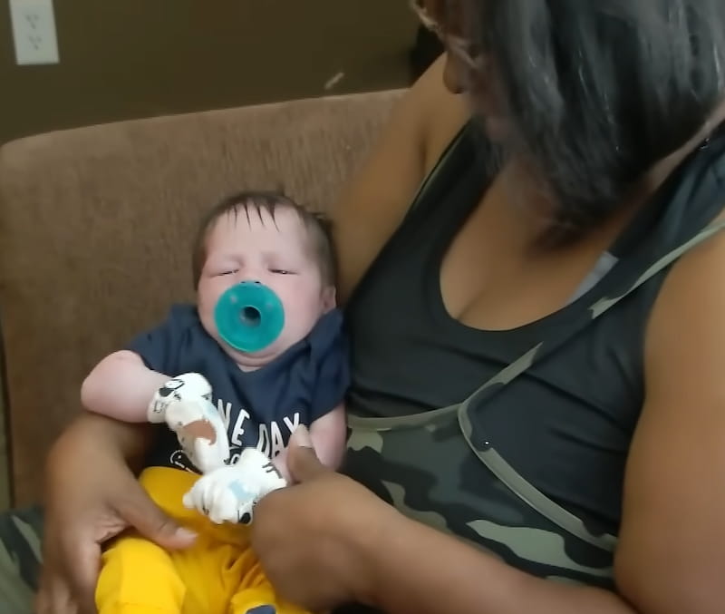 prison officer cares for inmates baby kayson 3